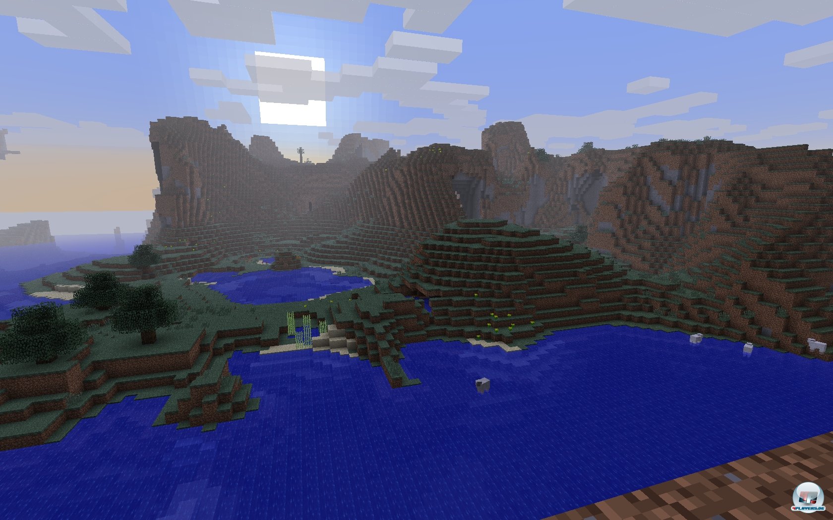 Vertr&auml;umte Spieleromantik: Die Sonne schiebt sich hinter dem hohen Berg nach oben - und verbrennt untote Mnster.