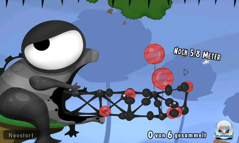 Mit den schwarzen Knet-Knubbeln baut man neue Vertsrebungen. Hier halten die roten Helium-B&auml;lle das wackelnde Ger&uuml;st in der Schwebe.